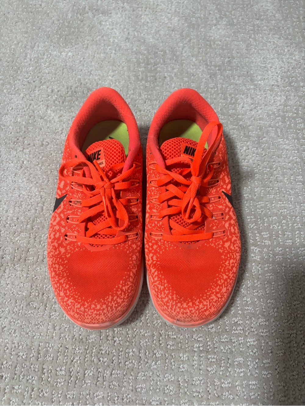 Nike Women's Neon Orange Sneakers with Black Swoosh